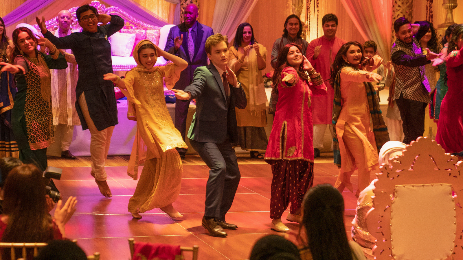 Bruno dancing at Aamir's wedding, he is in the center of the action.